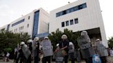 9 Egyptians on trial in Greece over shipwreck, as rights groups question process