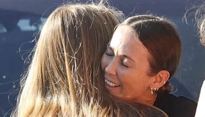 All grown up! Bec Hewitt embraces her daughter Mia, 18, before former Home and Away star heads off on an overseas adventure with her youngest daughter Ava, 13