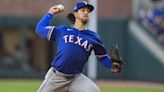 Rangers slug three homers to avert sweep by Braves