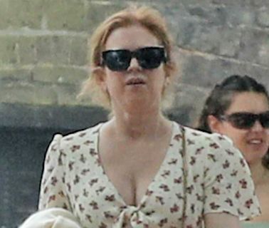 Newly-single Isla Fisher steps out for a summer stroll in Hampstead