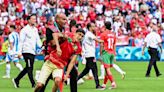 Fans storm pitch and throw bottles as Argentina v Morocco descends into chaos to kick off Olympics