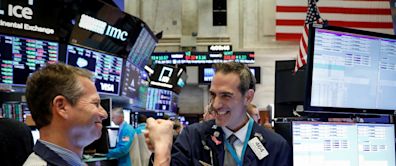 Stock market today: Dow slides, Nasdaq closes at record to cap winning week