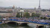Paris Olympics opening ceremony cheer undampened by security checks, threat of rain