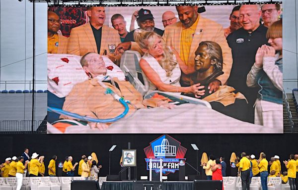 Steve McMichael, who has ALS, enters the Pro Football Hall of Fame in ceremony at home