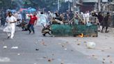 As Bangladesh reels under deadly clashes, 245 Indians return home