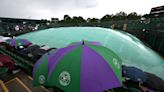 Heavy Downpours Suspend Play on Outdoor Courts at Wimbledon