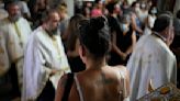 AP PHOTOS: Spiritual, material mix at Greek mid-August feast
