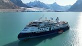 Stranded luxury cruise ship MV Ocean Explorer is pulled free at high tide in Greenland