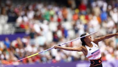 Athletics-Belgium's reigning champ Thiam takes heptathlon lead