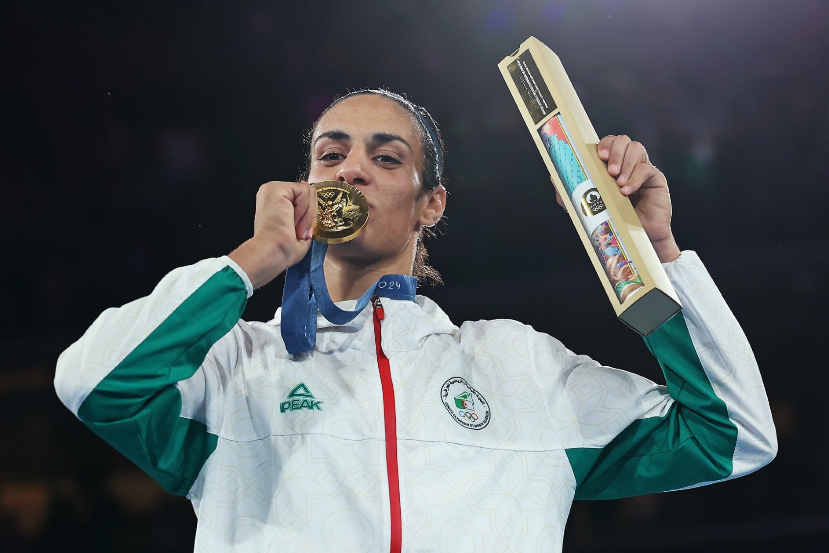 Algerian boxer Imane Khelif, target of attacks on her gender, wins gold