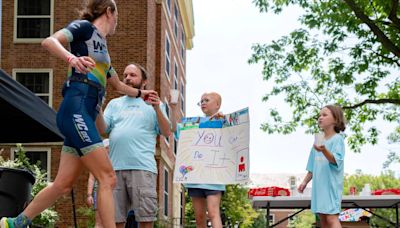 ‘About building community’: How volunteers at Happy Valley’s Ironman make the triathlon run