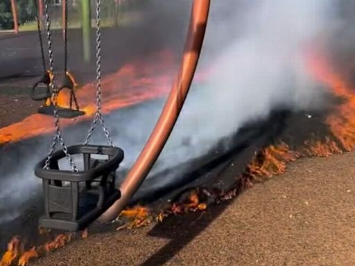 Smoke billows from park as children's playground set on fire again