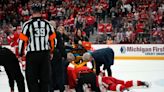 Detroit Red Wings captain Dylan Larkin leaves game after punch to the head