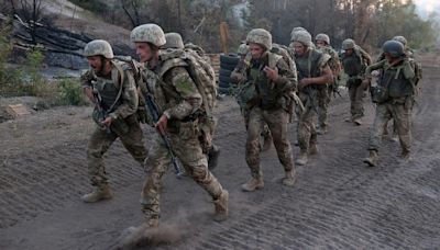 Ukraine's desperate need for soldiers spurs exodus of young men
