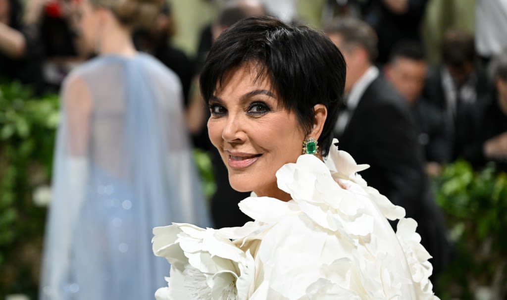 Kris Jenner Goes Monochrome in Dramatic White Oscar de la Renta Gown With Pops of Statement Gems for Met Gala 2024 Red Carpet