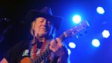 Willie Nelson performing at Brandon Amphitheater