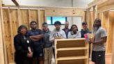 Lorain High architectural design students make bookshelves to promote literacy at businesses