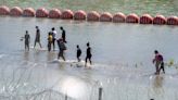 Democrats tour Rio Grande amid criticism of recently installed buoys, razor wire