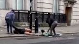 Horrific moment two people 'mugged' by thugs near London station