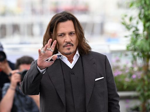 Johnny Depp says he's not 'remotely close to normal' and fame can do 'funny things to a man'