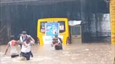 VIDEO: Traffic Cop, Local Heroes Rescue Children From School Bus Trapped In Flooded Underbridge In MP