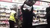 Moment suspected thief is cornered by a horde of angry Asda workers