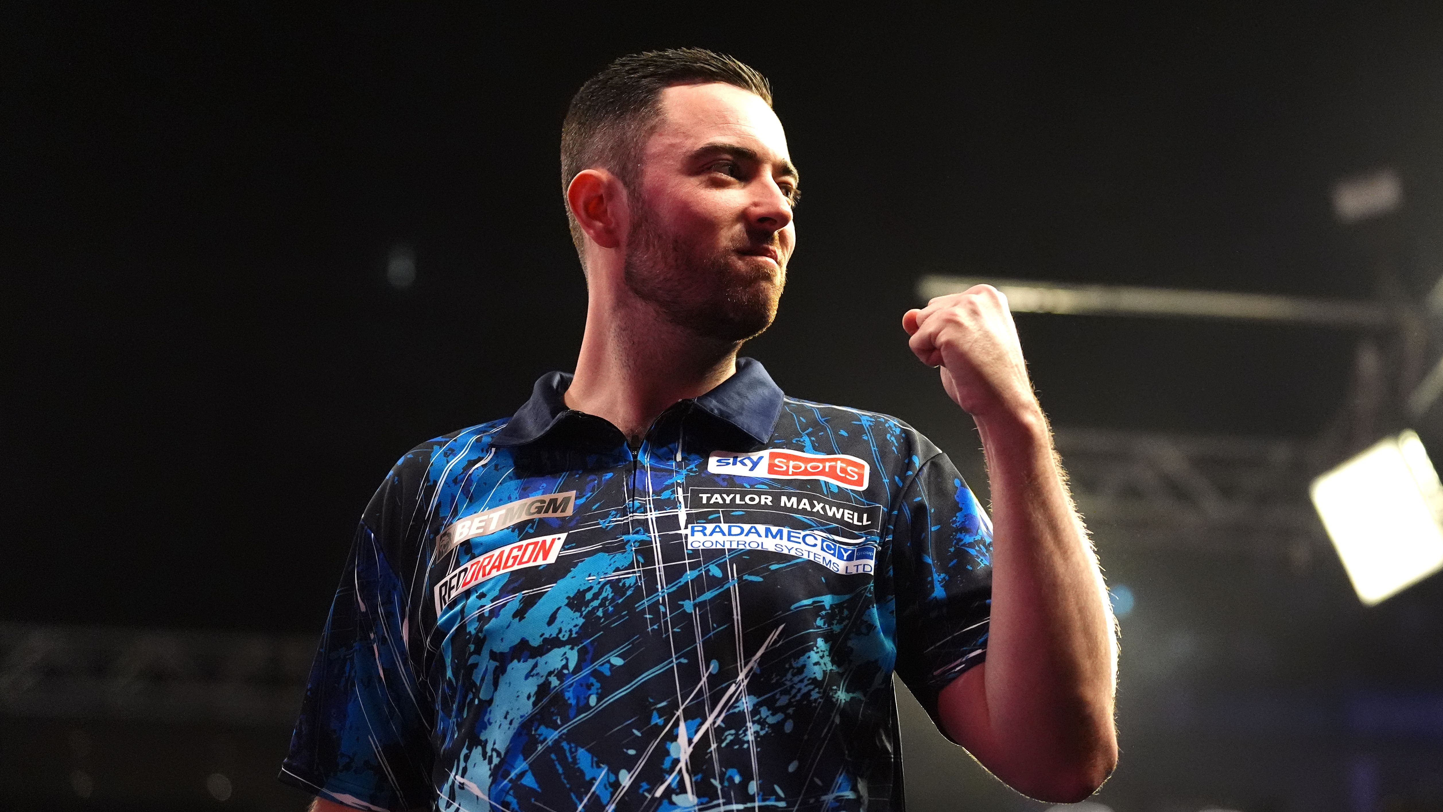 Luke Humphries battles past Dimitri Van den Bergh to reach Blackpool semis