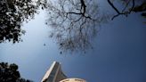 Indian shares inch lower as IT stocks weigh