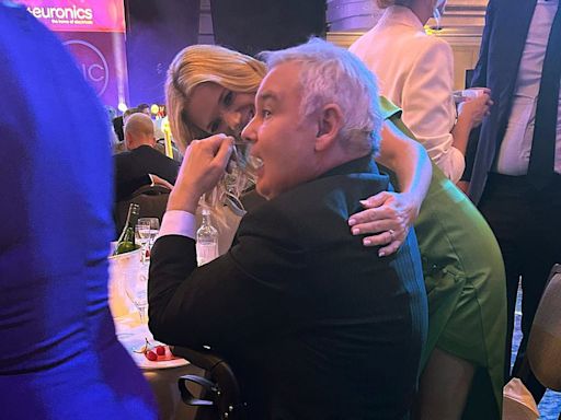 Eamonn Holmes is comforted by Charlotte Hawkins at TRIC Awards