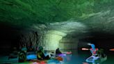 This Glass-bottomed Kayak Tour Through an Abandoned Mine in Kentucky Brings You to an Underground Waterfall