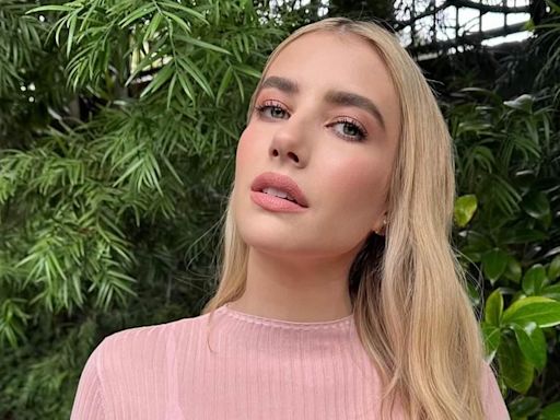 Emma Roberts stuns in pink ruffled gown and pinstripe dress