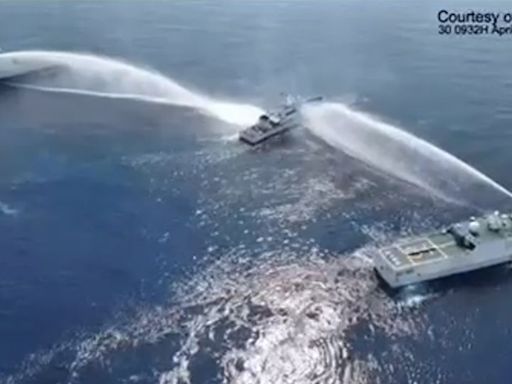 Chinese water cannon damages ship in new South China Sea flare-up, Philippines says