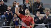 Novak Djokovic keeps his French Open title defense going by getting past Lorenzo Musetti in 5 sets - WTOP News