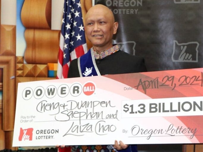 The cancer-stricken winner of the $1.3 billion Powerball jackpot in Oregon will get a $422 million lump-sum after taxes and says he'll keep playing the lottery