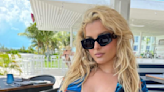 Bebe Rexha Rocks A Swimsuit With A Deep Plunge, And Her Abs Are Next-Level Killer