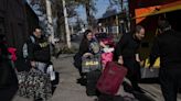 The 23-Hour Shopping Frenzy: Argentines Stampede Over Border