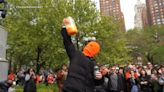 Hundreds watched 'Cheeseball Man' eat an entire tub of cheeseballs in NYC