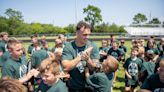 A full-circle moment: NFL linebacker hosts youth football camp at high school alma mater