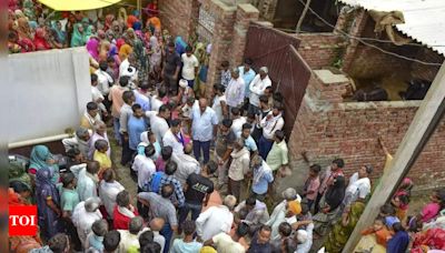 Frantic search for missing ones as toll in Hathras stampede reaches 121 | Agra News - Times of India