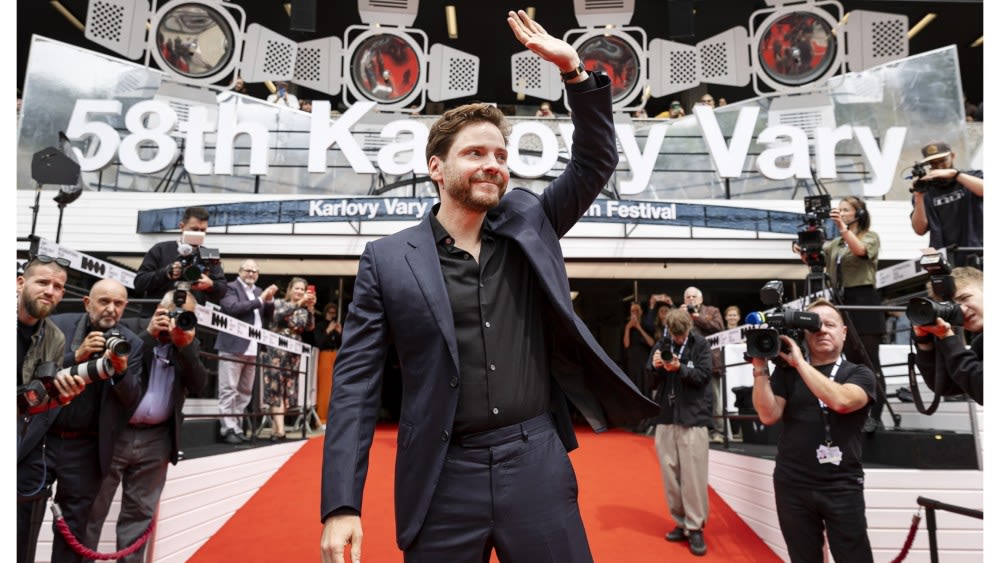 ...Daniel Brühl Talks Giving Jude Law a ‘Hard Time’ in Ron Howard’s ‘Eden,’ Working With ‘Maniac’ Ruben Östlund and...