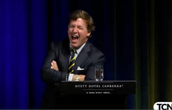 Tucker Carlson Takes on Australian Reporter After Searing Putin Question