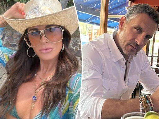 Kyle Richards flaunts her figure in a bikini after ex Mauricio Umansky was spotted kissing another woman