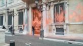 Climate activists spray paint Italian senate building orange using fire extinguishers