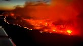 Canadian crews battle wildfire threatening remote western town