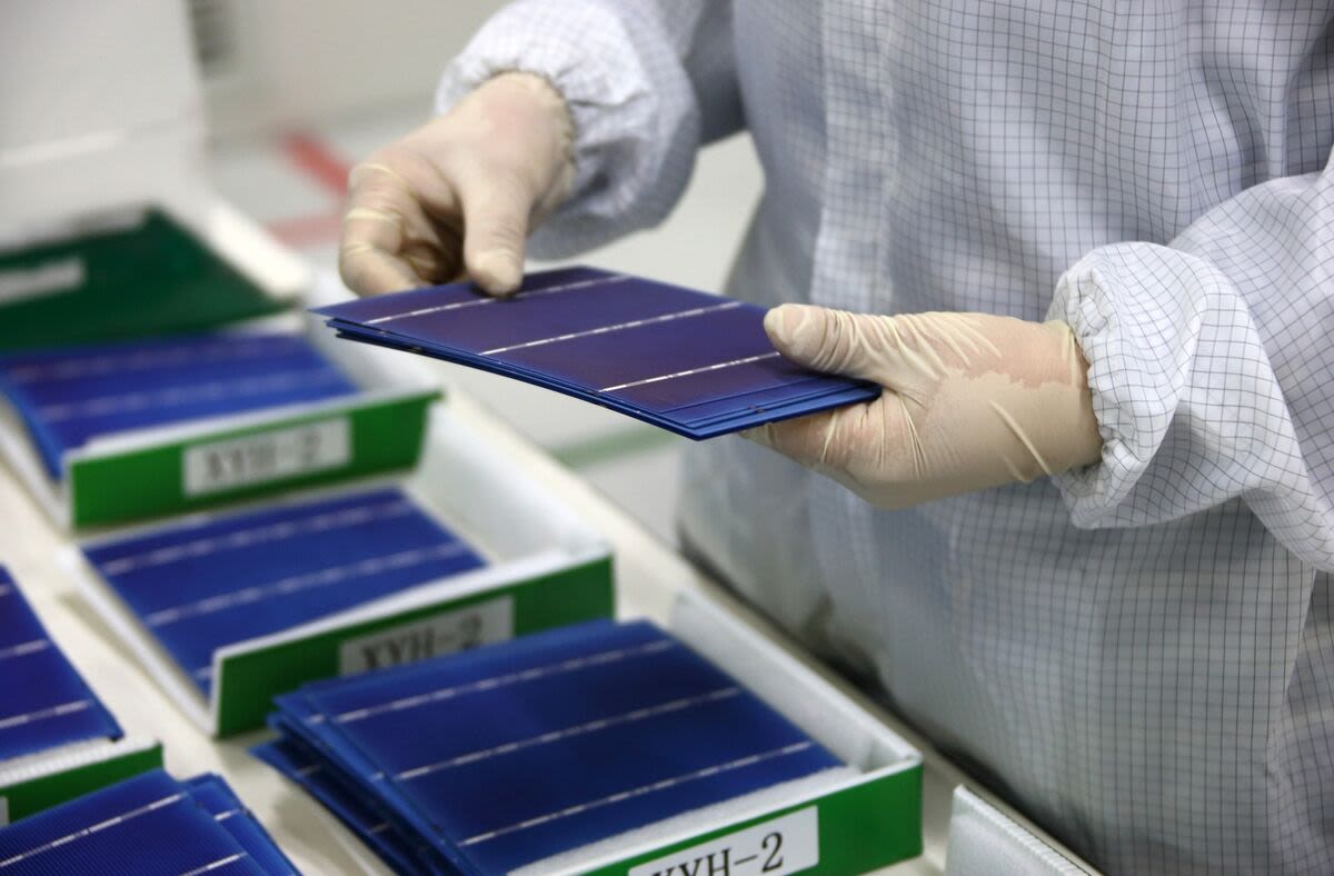 Biden’s Solar Factory Boom Slows as Cheap Imports Flood Market