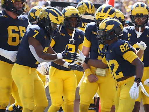 University of Michigan football program penalized for Covid-era recruiting violations, NCAA says