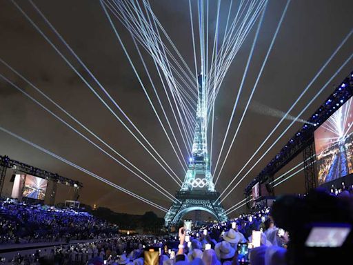 Doused by rain, Paris opens its Games with a boat party on the Seine