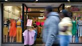 Chilly June prompts UK consumers to cut back their spending