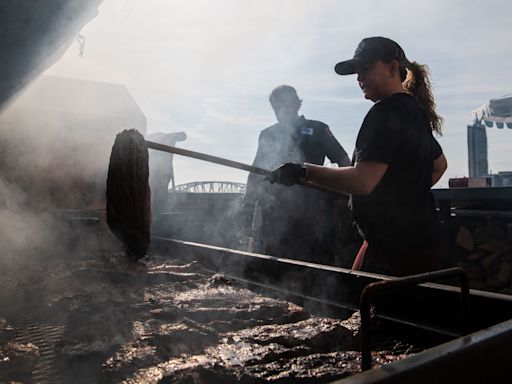 Cooking whole hog barbecue on a Broadway rooftop in Nashville: Pitmasters for a day