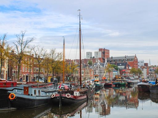 Skip the tourist traps and high prices in Amsterdam — take a short train ride to this beautiful gem instead